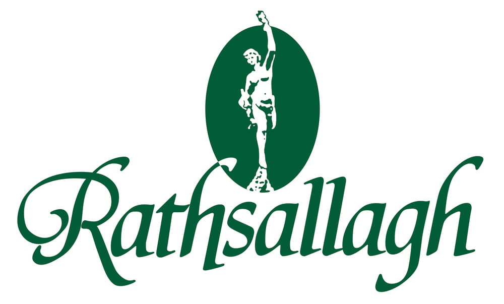 The logo features the word "Rathsallagh" in green script below a green oval containing a statue of a raised-arm figure.